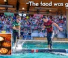 Two competitors are log rolling in a water tank in front of an audience with a quote saying Great time for the WHOLE FAMILY by Paula and a collage of food items displayed in the inset